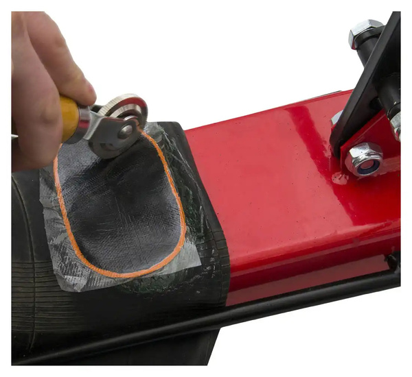 Tyre repair patch roller with wooden handle